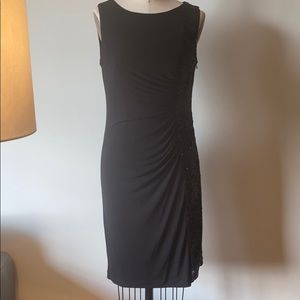 Black dress with right side sequins, stretch.